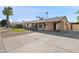 Charming single-story home with a well-manicured lawn, driveway, and inviting curb appeal at 2525 E Nisbet Rd, Phoenix, AZ 85032