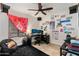 Office space with tile floors, a ceiling fan, and a window with blinds at 2525 E Nisbet Rd, Phoenix, AZ 85032