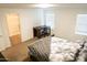 Bright bedroom with natural light, a desk, and comfortable bed creates a serene atmosphere at 27 N 199Th Ave, Buckeye, AZ 85326