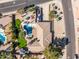 Aerial view of a home with a pool, lush landscaping, and a spacious backyard at 301 E Carol Ann Way, Phoenix, AZ 85022