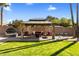 Charming backyard gazebo with comfortable seating, creating a serene outdoor retreat at 301 E Carol Ann Way, Phoenix, AZ 85022