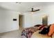 Bright main bedroom with neutral carpet and a view of a large walk-in closet at 301 E Carol Ann Way, Phoenix, AZ 85022