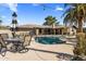 Inviting backyard pool area with ample seating, ideal for summer relaxation and gatherings at 301 E Carol Ann Way, Phoenix, AZ 85022