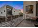 Balcony view of modern architectural neighborhood with cozy seating and colorful sunset at 3106 N 70Th St # 2003, Scottsdale, AZ 85251