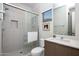 Contemporary bathroom featuring a glass shower and modern vanity with sleek fixtures and ample lighting at 3106 N 70Th St # 2003, Scottsdale, AZ 85251