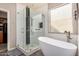 Modern bath showcasing walk-in shower and tub at 3194 E Mead Dr, Chandler, AZ 85249