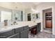 Stylish bathroom with double vanities, glass shower, and soaking tub at 3194 E Mead Dr, Chandler, AZ 85249