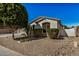 Single story home exterior featuring desert landscaping and architectural details under a blue sky at 3194 E Mead Dr, Chandler, AZ 85249