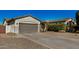 Well-maintained single-story home with a spacious driveway, desert landscaping, and a two-car garage at 3194 E Mead Dr, Chandler, AZ 85249