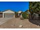 Charming single-story home with desert landscaping, mature trees, and a two-car garage at 3194 E Mead Dr, Chandler, AZ 85249