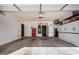 Spacious garage with storage, a fridge and exterior access at 3194 E Mead Dr, Chandler, AZ 85249