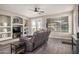 Modern living room with built-in shelves, comfortable seating, and French doors at 3194 E Mead Dr, Chandler, AZ 85249