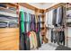 Spacious walk-in closet with custom shelving provides ample storage space for clothes and accessories at 3194 E Mead Dr, Chandler, AZ 85249