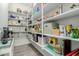 Walk-in pantry with ample shelving for organized storage at 3932 E Torrey Pines Ln, Chandler, AZ 85249