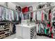 Walk-in closet featuring ample clothing and shoe storage at 3932 E Torrey Pines Ln, Chandler, AZ 85249