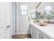 Well-lit bathroom featuring modern fixtures, white cabinetry, and stylish decor at 5139 S Bridal Vail Dr, Gilbert, AZ 85298