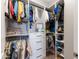 Organized walk-in closet featuring built-in shelving and ample storage space for clothing and accessories at 5139 S Bridal Vail Dr, Gilbert, AZ 85298