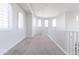 Hallway featuring carpeted floors and white walls at 5139 S Bridal Vail Dr, Gilbert, AZ 85298