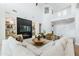 Bright and airy living room featuring a fireplace, built-in shelves, and a soaring ceiling at 5139 S Bridal Vail Dr, Gilbert, AZ 85298