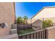 Enclosed backyard with a small patch of artificial turf at 5161 N Scottsdale Rd, Eloy, AZ 85131