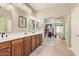 Dual sink vanity leading to closet and Primary bedroom at 5161 N Scottsdale Rd, Eloy, AZ 85131