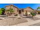 Charming single-story home showcasing desert landscaping and a welcoming front entrance at 5161 N Scottsdale Rd, Eloy, AZ 85131