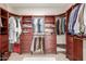 Large walk-in closet features custom shelving and rods for ample storage at 5356 W Jupiter Way, Chandler, AZ 85226