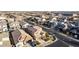 Aerial view of a desert neighborhood showcasing a well-maintained home with mature landscaping at 5539 S Verde --, Mesa, AZ 85212