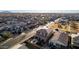 Aerial view of a desert neighborhood showcasing a well-maintained home with an outdoor kitchen at 5539 S Verde --, Mesa, AZ 85212