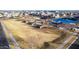 An aerial view of a community park features a playground and plenty of open space at 5539 S Verde --, Mesa, AZ 85212