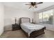 Comfortable bedroom with a neutral color palette, soft carpet, and ample natural light at 5539 S Verde --, Mesa, AZ 85212