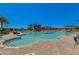 Resort-style community pool with a slide and seating areas perfect for relaxation and Gathering fun at 5539 S Verde --, Mesa, AZ 85212