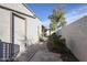 Exterior view with storage and covered patio beyond the gate at 592 Leisure World --, Mesa, AZ 85206