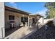 The covered patio includes space for grilling and entertaining at 592 Leisure World --, Mesa, AZ 85206