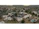 Aerial view of the condos, parking, landscape, and the surrounding neighborhood, showing a great location at 6009 N 79Th St, Scottsdale, AZ 85250