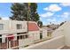 Inviting two-story condo building featuring red tile roof and well-kept landscaping at 6009 N 79Th St, Scottsdale, AZ 85250