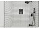 The shower has white subway tile, black hardware, and decorative accent tile in the inset at 6009 N 79Th St, Scottsdale, AZ 85250