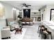 Bright dining area featuring built-in shelving, modern lighting, and comfortable seating for elegant meals at 6121 E Vernon Ave, Scottsdale, AZ 85257