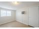 Cozy bedroom with tiled floor, window and closet at 625 W Central Ave, Coolidge, AZ 85128