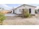 Charming single-story home featuring stucco walls, stone accents and low maintenance desert landscaping at 625 W Central Ave, Coolidge, AZ 85128