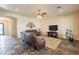 Spacious living room featuring tile floors and lots of natural light at 6786 W Appaloosa Trl, Coolidge, AZ 85128