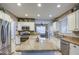 Bright kitchen showcasing granite countertops, stainless steel appliances, and a large center island for meal preparation at 7010 S San Jacinto Ct, Gilbert, AZ 85298