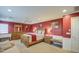 Bright main bedroom features a ceiling fan and a decorative accent wall with a cozy seating area at 7010 S San Jacinto Ct, Gilbert, AZ 85298