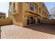 Paved back patio area perfect for outdoor entertaining with beautiful stucco walls at 7130 W Linda Ln, Chandler, AZ 85226