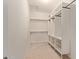 Walk-in closet with built-in shelving and storage solutions to maximize space at 7130 W Linda Ln, Chandler, AZ 85226