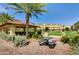 Community amenities feature a covered seating area and landscaped grounds at 7130 W Linda Ln, Chandler, AZ 85226