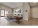 Inviting living room showcasing a comfortable couch, stylish chair, and a modern art piece at 726 E Aire Libre Ave, Phoenix, AZ 85022