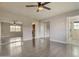 Spacious bedroom with large closet, ceiling fan, and adjacent renovated bathroom at 726 E Aire Libre Ave, Phoenix, AZ 85022