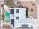 Home aerial view featuring a beautiful pool, landscaped yard, and modern solar panels at 790 N Meadows Dr, Chandler, AZ 85224