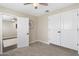 This is a bedroom that features a ceiling fan and carpeting at 790 N Meadows Dr, Chandler, AZ 85224